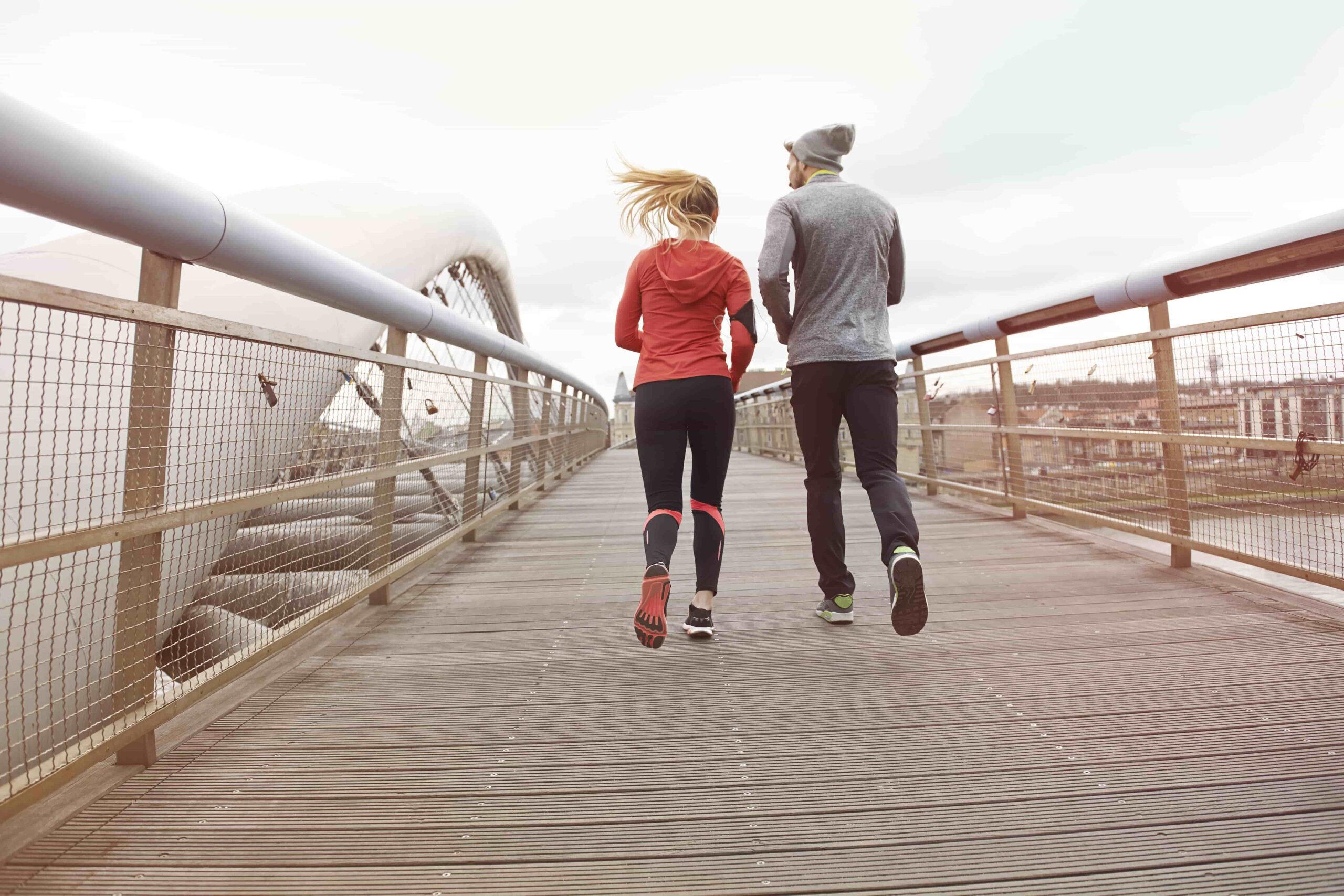 Two people jogging outdoors