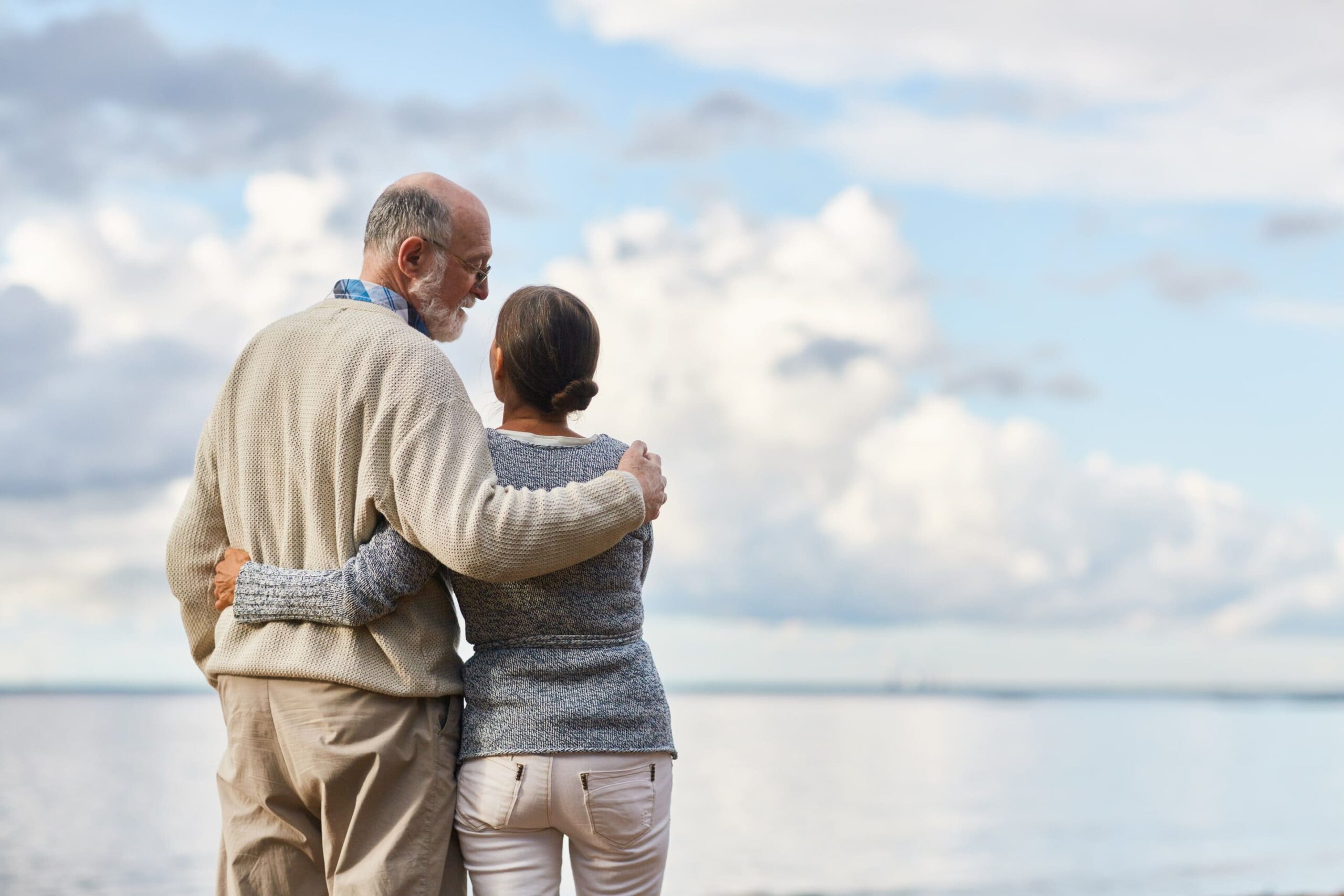 Older couple walking together outdoors